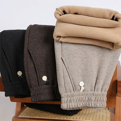 Spodnie z prostymi nogawkami, z elastycznej wełny jagnięcej, w jednolitym kolorze