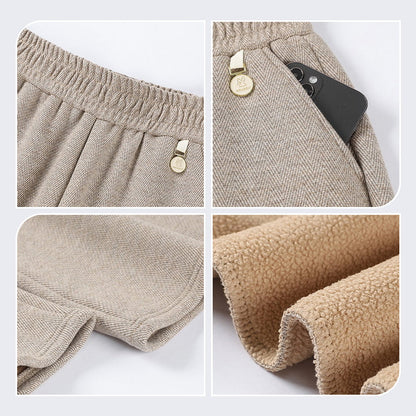 Spodnie z prostymi nogawkami, z elastycznej wełny jagnięcej, w jednolitym kolorze